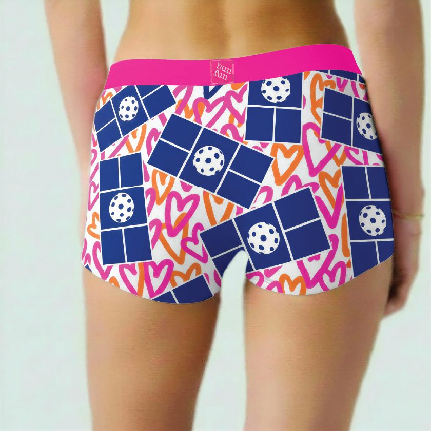 Colorful pickleball underwear with geometric pattern on a plain background