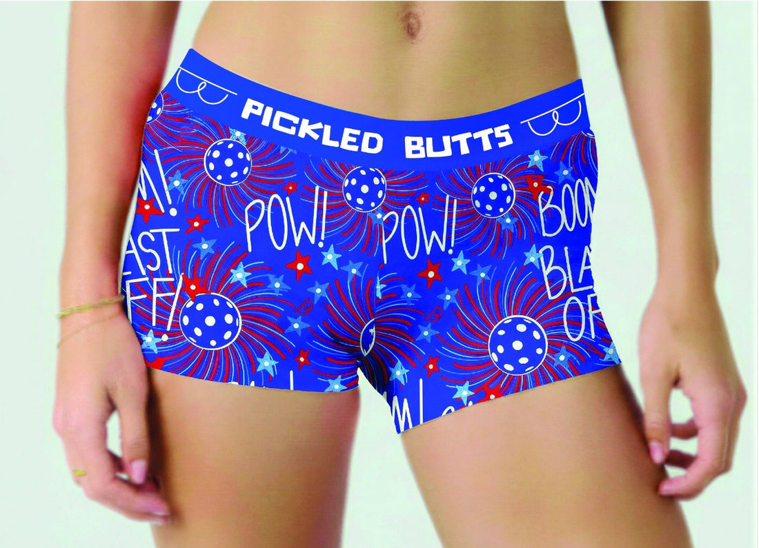 Firework-design-pickleball-underwear-women with red and white text and graphics on a light green background