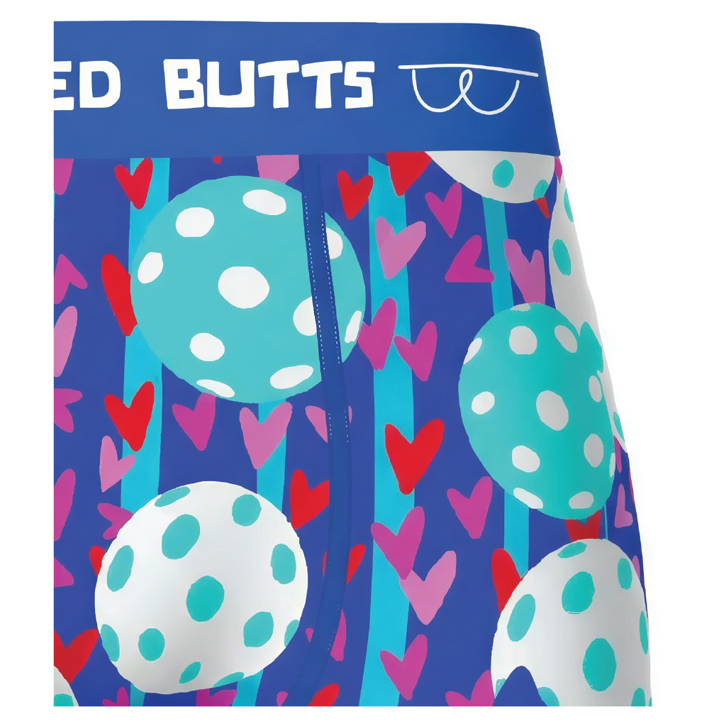 Colorful pickleball boxer for men with polka-dot balloons and heart patterns on a blue background.