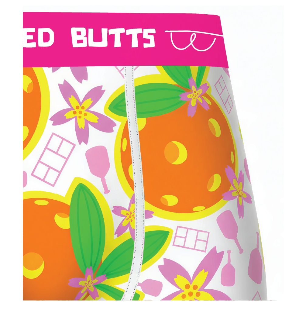 Colorful patterned product packaging with 'Red Butts' branding on a white background